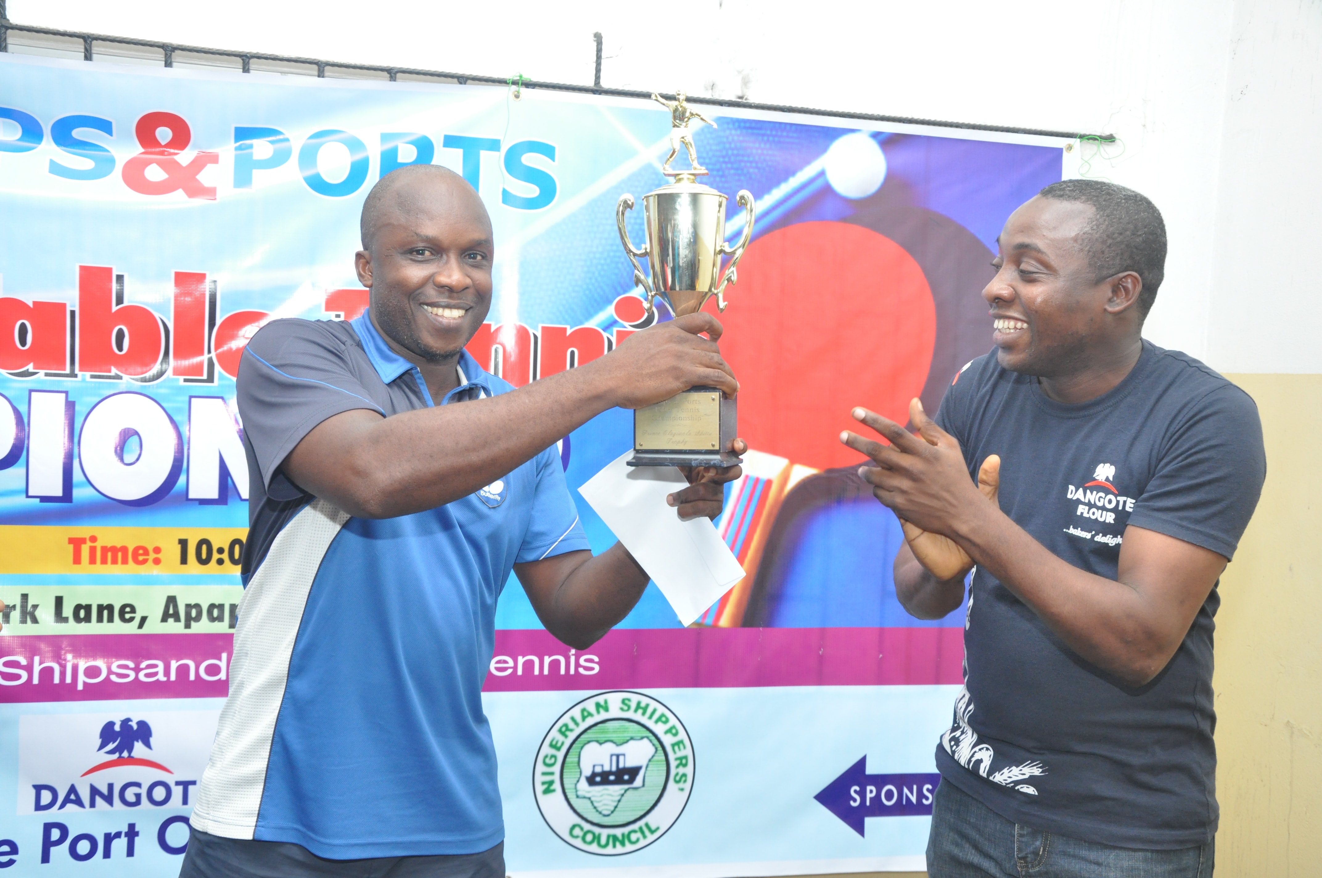 The winner, Jeremiah Ikoko and Awosola Olalekan of Dangote Ports Operation.