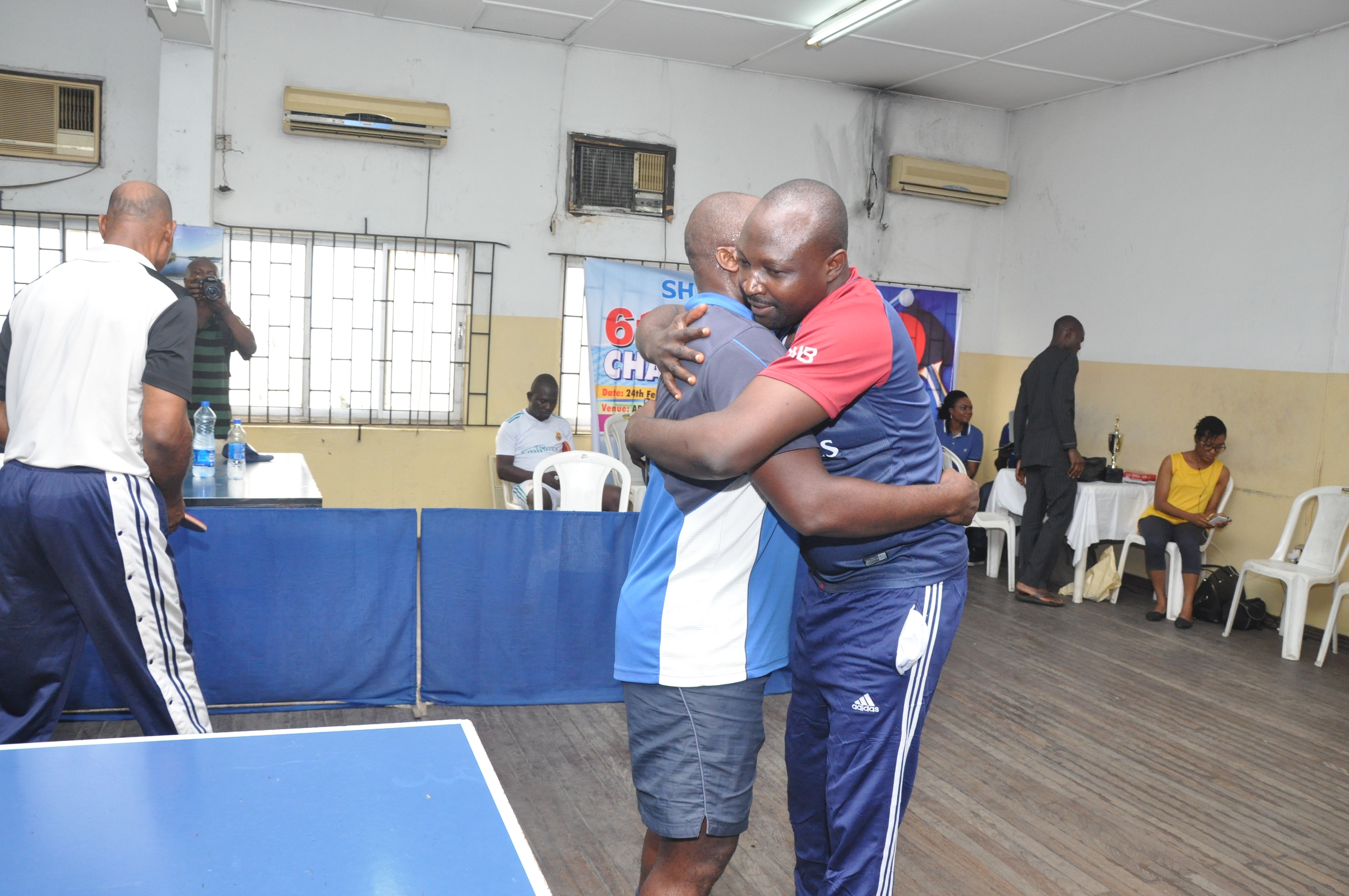 Achonu Michael of TICT congratulating Jeremiah Ikoko of NIMASA after Ikoko won the final match.