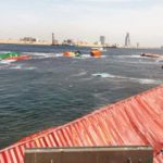 Pakistan port pulls containers from sea after ship scrapes another