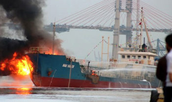 Fire engulfs ship at Vietnam port