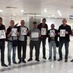Stranded seafarers return home after four months