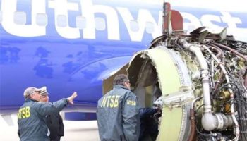 U.S. inspectors investigate mid-air jet engine explosion