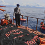 Rescuers search for victims of ferry disaster in Indonesia
