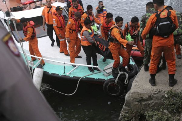 Divers, underwater drone join search for missing ferry passengers