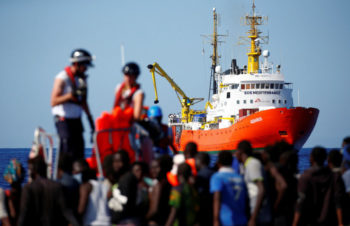 Spain opens port to ship carrying migrants 
