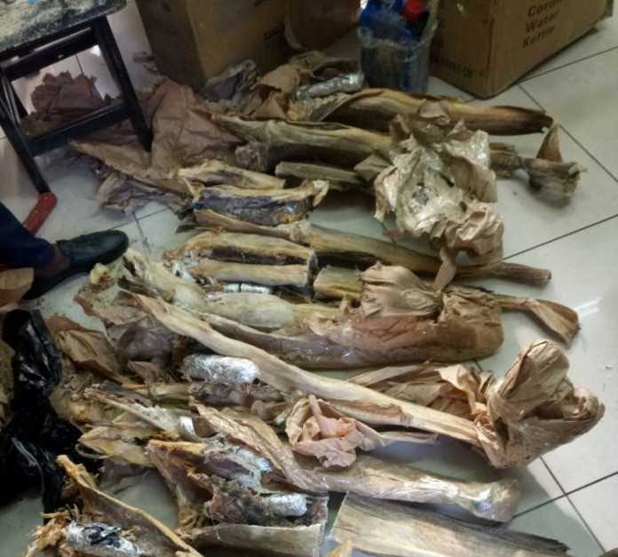 PHOTOS: Ghana arrests two Nigerians with drugs hidden in stockfish