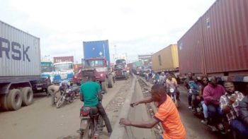 We defecate in nylon bags and throw it across the bridge, say truck drivers stuck in Apapa gridlock