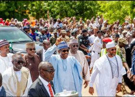 PHOTOS: Buhari treks home after prayers, aide says he’s fit for second term