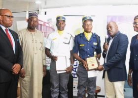Firm rewards airport security guard who returned bag of dollars 