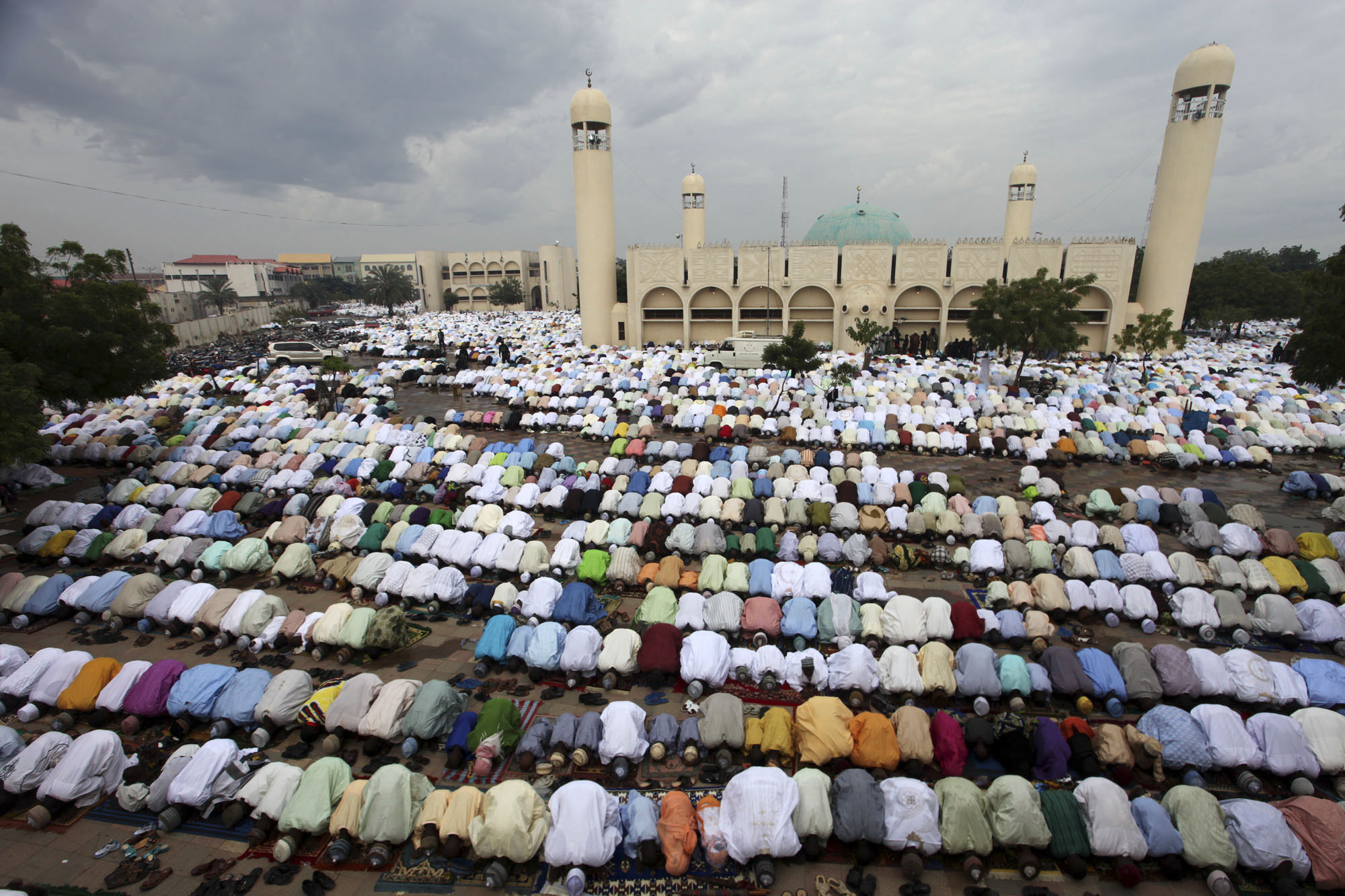 Muslims pray at the Kofar Mata central mosque to mark the end of the holy month of Ramadan in Nigeria's northern city of Kano