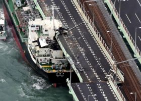 Typhoon: Japan evacuates major airport after tanker smashes bridge