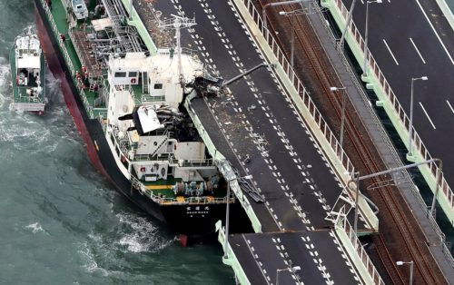 Typhoon: Japan evacuates major airport after tanker smashes bridge