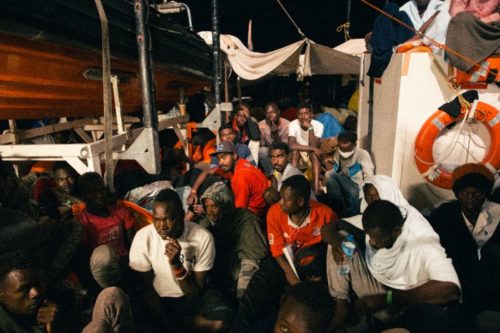 Libyan coast guards eject migrants off cargo ship