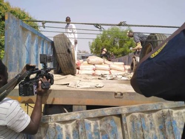 PHOTOS: Customs impounds Dangote truck used to smuggling rice 