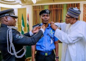 PHOTOS: Buhari decorates new Inspector General of Police