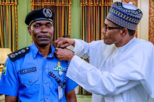 PHOTOS: Buhari decorates new Inspector General of Police 