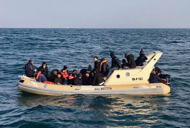 British boat rescues some 20 migrants trying to cross English Channel