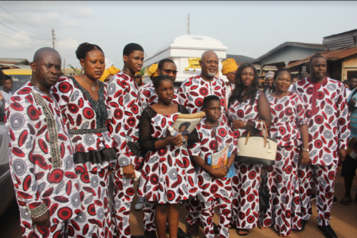 Ogbeifun in a group photograph with family members.