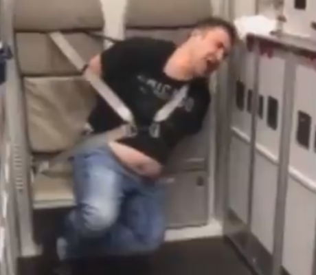 VIDEO: Passengers tie up violent medical doctor on plane mid-air