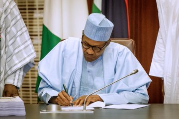 President Buhari signs N8.92tr 2019 budget into law