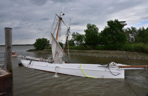 German wooden schooner sinks after colliding with containership._