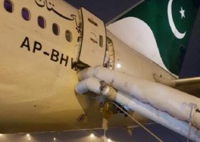 Passenger opens aircraft emergency exit door 
