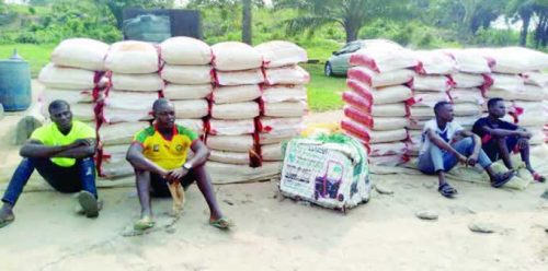 Navy arrests five suspects, seizes 424 bags of contraband rice