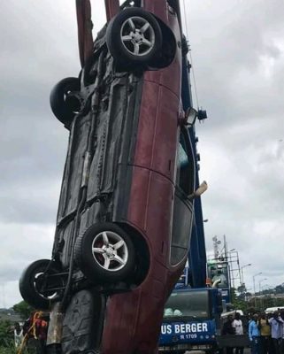 Woman dies as car plunges into river