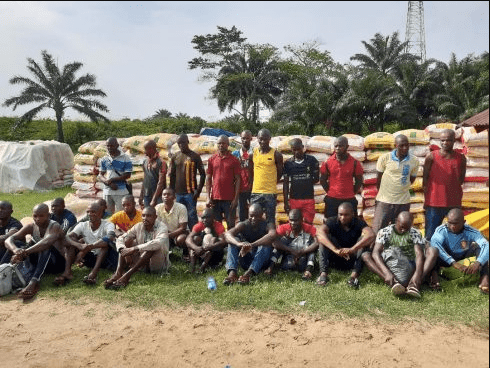 Navy arrests 24 suspects, seizes 1,831 bags of rice 