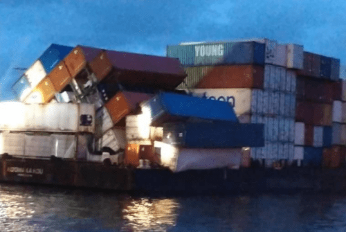 Over 20 containers fall off barge 