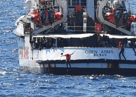 70 migrants jump overboard from charity boat 