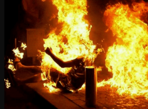 Libyans set Nigerian ablaze, watch him burn to death