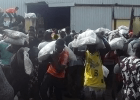 VIDEO: Residents loot, damage Customs office in Yola 