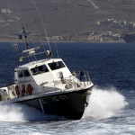 Greek coastguard finds body of migrant near half-sunken boat