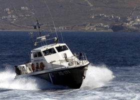Greek coastguard finds body of migrant near half-sunken boat