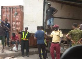 Tiles worth millions of naira damaged as container falls off truck in Apapa