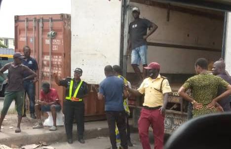 Tiles worth millions of naira damaged as container falls off truck in Apapa