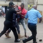 Pandemonium as Civil Defense official beats up policeman in Apapa 