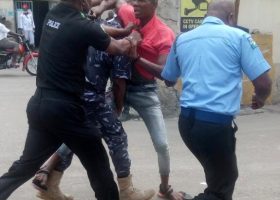 Pandemonium as Civil Defense official beats up policeman in Apapa 