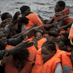 Rescue boat with hundreds of migrants on board beg for port