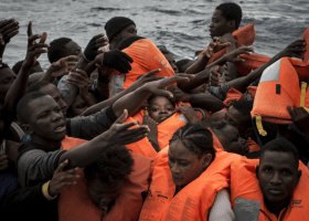 Rescue boat with hundreds of migrants on board beg for port