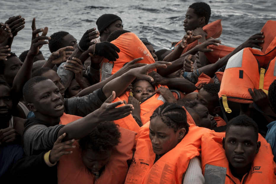 Rescue boat with hundreds of migrants on board beg for port
