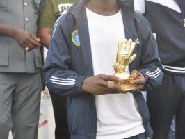Nigerian Navy’s Ayetoba Iseoluwa receives the Best Goalkeeper of the tournament award.