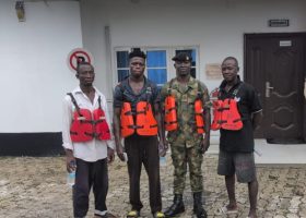 Navy Rescues Three