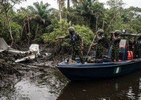 Navy, Marine Police Search for Crash Victims